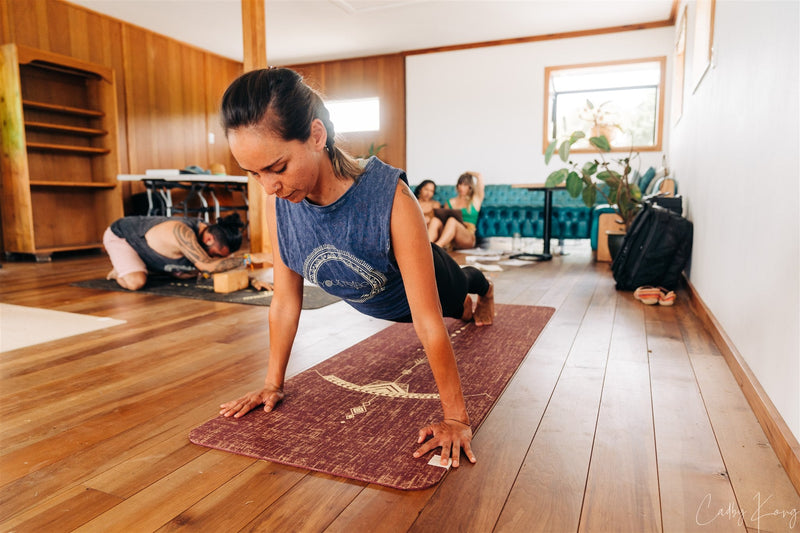 Bow and Arrow Design Printed on  Red Wine coloured PER and Organic Jute Yoga Mat. 