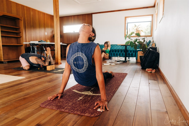 Bow and Arrow Design Printed on  Red Wine coloured PER and Organic Jute Yoga Mat. 